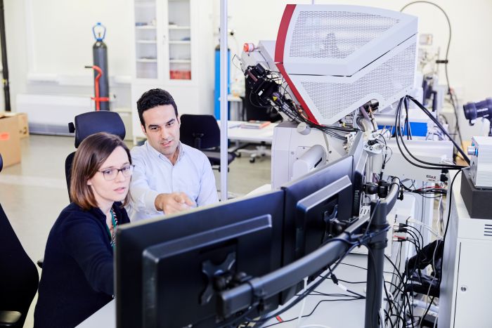 researchers in front of computers